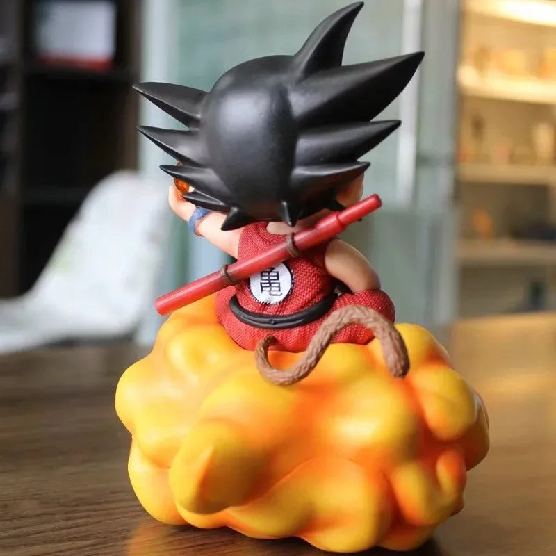 Young Son Goku Action Figure - Dynamic Pose sitting on Flying Nimbus cloud