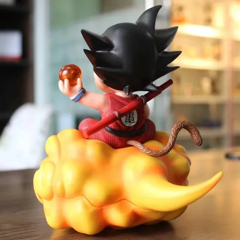 Young Son Goku Action Figure - Dynamic Pose sitting on Flying Nimbus cloud